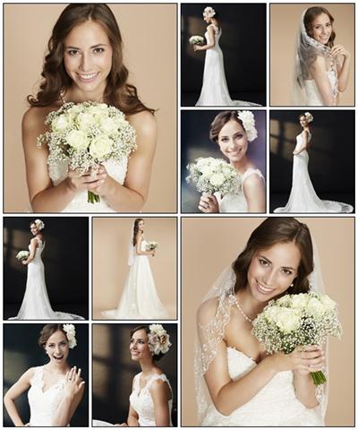 Stunning young bride holding bouquet - Stock Photo